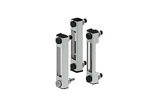 Fluid level gauges for continuous fill level monitoring