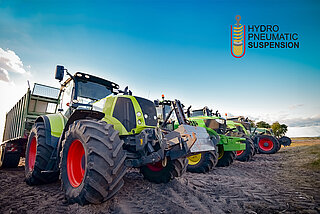 Various tractors in a row demonstrate the many uses of HYDAC suspension systems.
