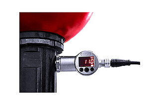 P0-guard with illuminated “bar 110” display attached to a hydraulic accumulator