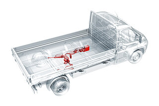Rendering of a commercial vehicle with the rear axle suspension labelled
